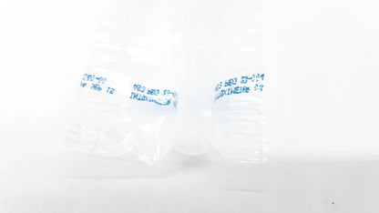 Clear plastic packaging with blue text containing a small white object for disposable dental things reuse medical use