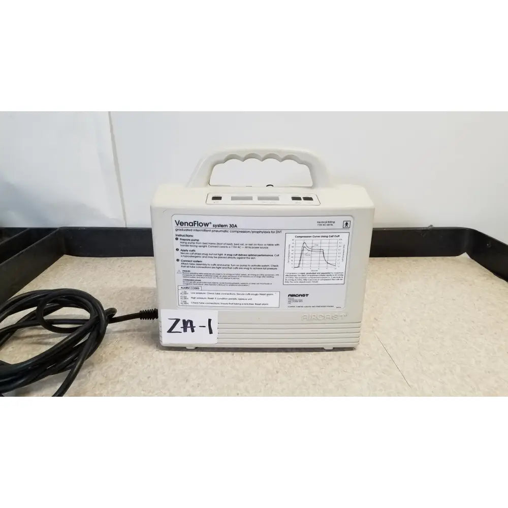 Off-white plastic djo aircast venaflow 30a portable blood flow device with molded handle and black power cord