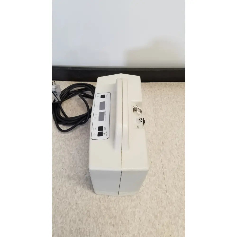 White medical-grade oxygen concentrator with control panel and handle for djo aircast venaflow 30a vascular system
