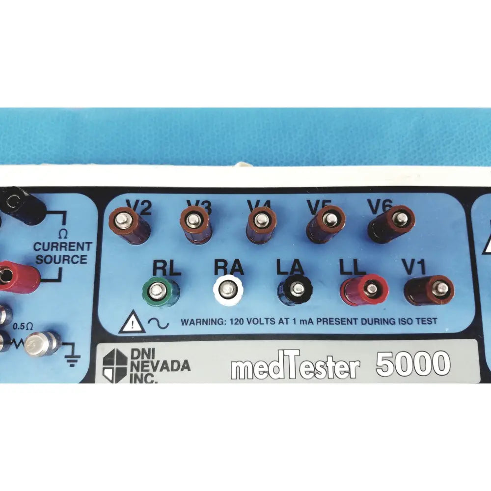 Blue panel of the dni nevada medtester 5000 electrical safety analyzer featuring labeled terminals with colored connectors