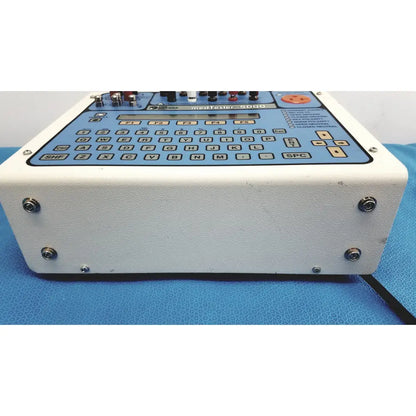 White plastic dni nevada medTester 5000 electrical safety analyzer with blue keypad and control panel for electrical safety