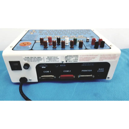 White industrial control panel with black switch and labeled ports including com 1 on dni nevada medTester 5000 electrical safety analyzer