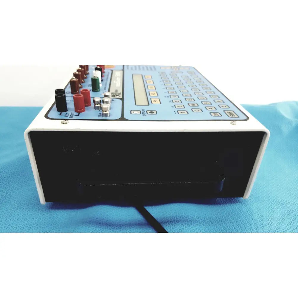 Dni Nevada medTester 5000 electrical safety analyzer in white and light blue with keypad and colored input jacks