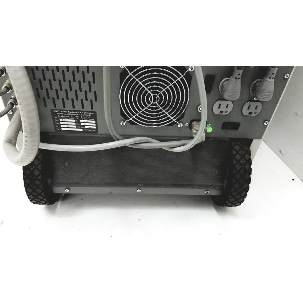 Gray industrial-grade dental delivery unit with black rubber wheels and ventilation fan on back panel by DNTL Works