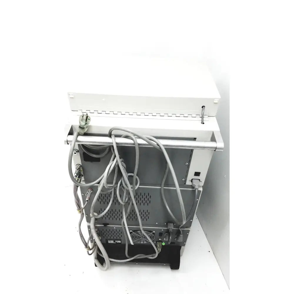 White industrial-grade dntl works p-2000 dental delivery unit with gray cables and metallic accents for dental delivery use