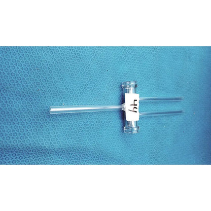 Clear glass t-shaped double oblique bore glass stopcock with white label 64 made of borosilicate for precision control