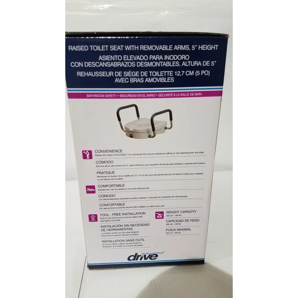 White plastic drive raised toilet seat with 5 inch height and removable arms for enhanced support and comfort