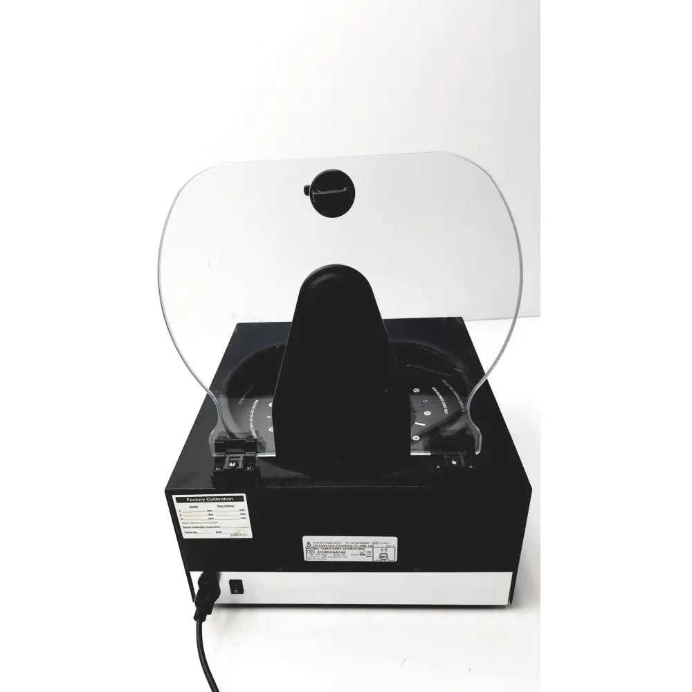 Black drucker diagnostics dash apex 24 centrifuge with transparent protective shield and circular rotor chamber