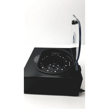 Black rectangular drucker diagnostics dash apex 24 centrifuge with transparent lid and multi-sample circular rotor