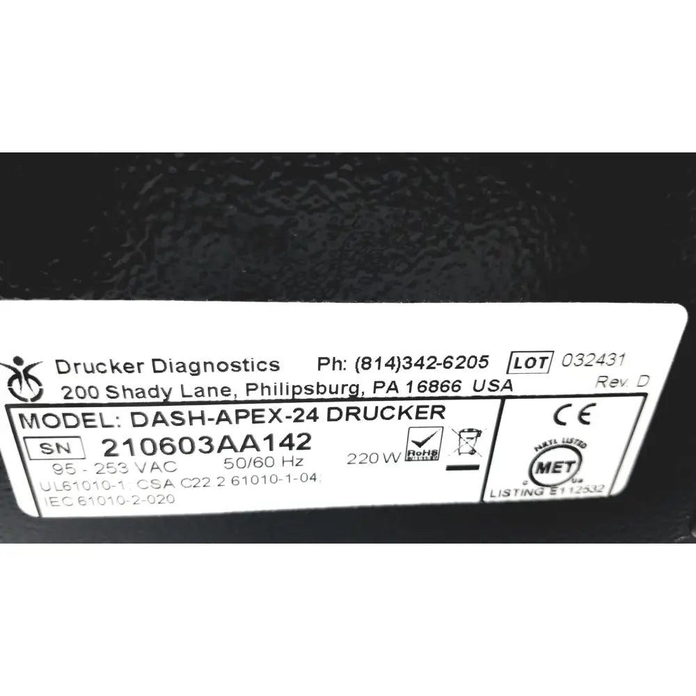 Black drucker diagnostics dash-apex-24 centrifuge medical device with white label showing serial number and regulatory markings