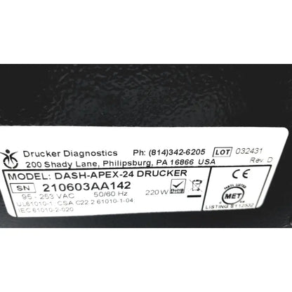 Black drucker diagnostics dash-apex-24 centrifuge medical device with white label showing serial number and regulatory markings