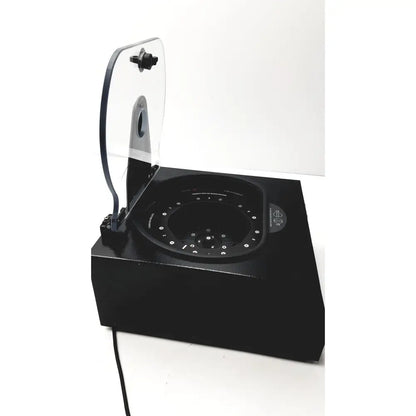 Black rectangular drucker diagnostics dash apex 24 centrifuge with transparent hinged lid and circular interior with white dots