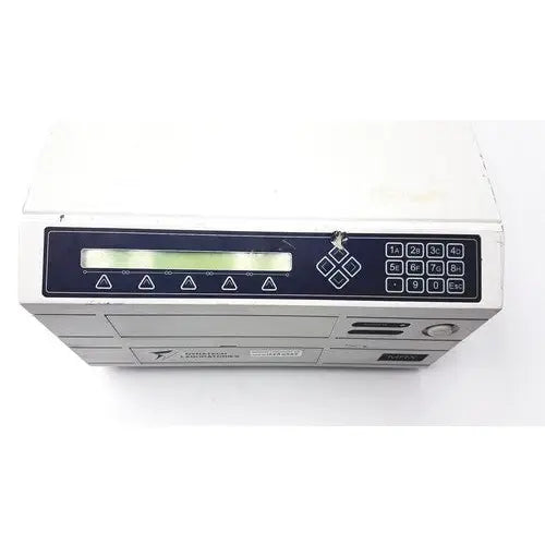 White plastic dynatech mrx microplate reader with black control panel featuring lcd screen and numeric keypad
