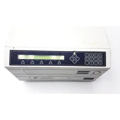 White plastic dynatech mrx microplate reader with black control panel featuring lcd screen and numeric keypad
