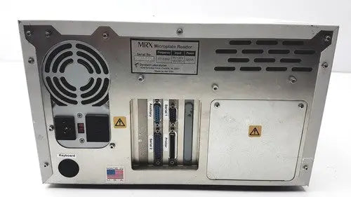 Silver metallic server rack with multiple ports and ventilation grilles on the back of dynatech mrx microplate reader