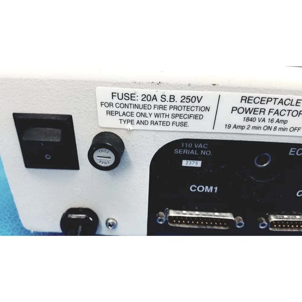 White industrial control panel with black switch fuse holder and d-sub connectors on dynatech nevada medtester 5000 biomedical electrical safety analyzer