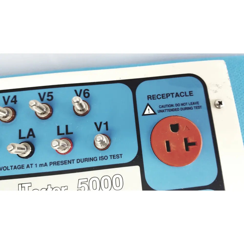 Blue panel with silver test terminals and red receptacle for dynatech nevada medtester 5000 biomedical electrical safety analyzer