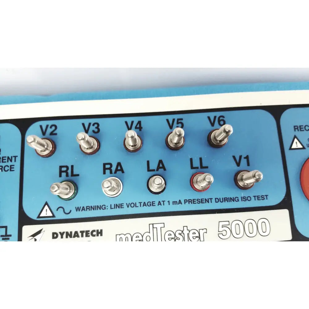 Blue panel of dynatech nevada medtester 5000 with silver and red connectors for biomedical electrical safety testing