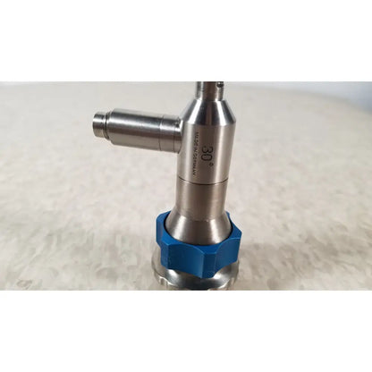Dyonics 30 degree SN HR 268768 sleek metallic industrial inspection camera lens with blue hexagonal base made in Germany for reuse medical purposes