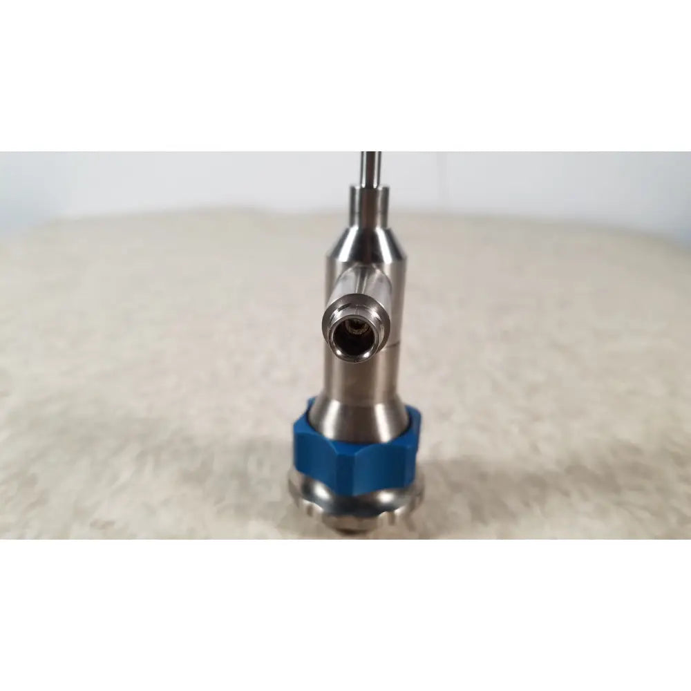 Silver Dyonics 30 degree SN HR 268768 surgical instrument with blue hexagonal base designed for reuse medical applications