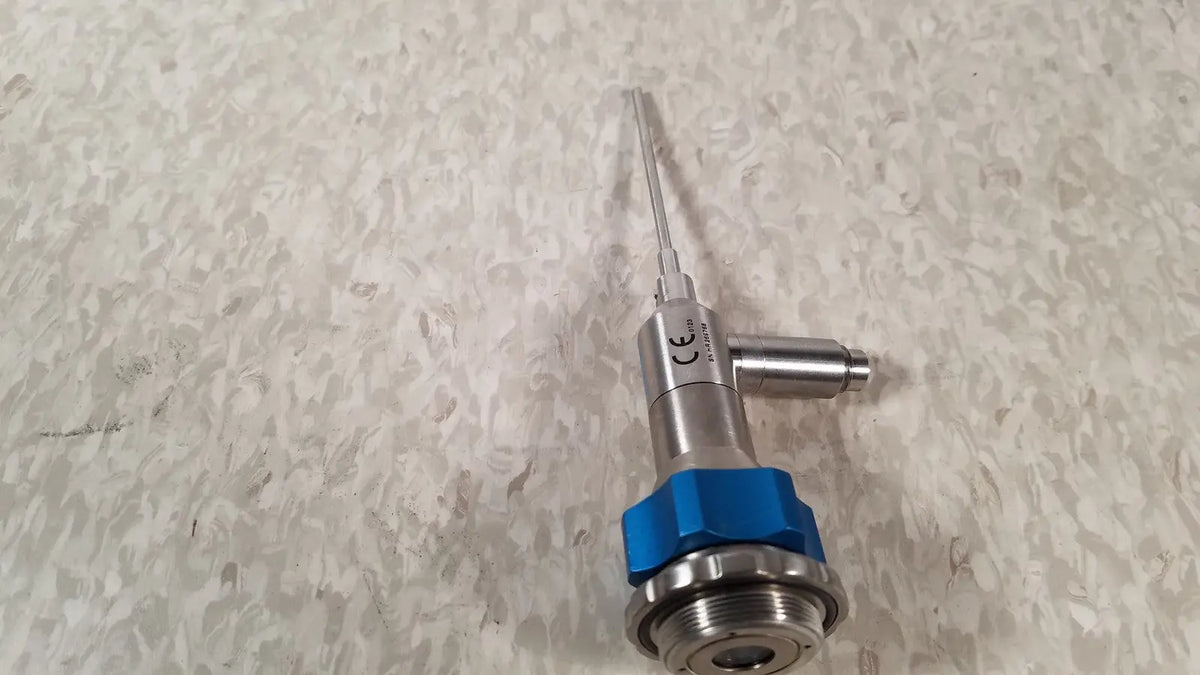Dyonics 30 degree silver metallic medical probe with blue hexagonal connector and CE marking for reuse medical applications