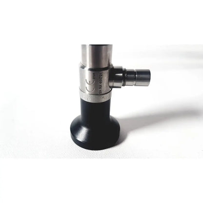 Black and silver dyonics autoclavable arthroscope sinuscope with cylindrical body and engraved serial number for reuse medical use