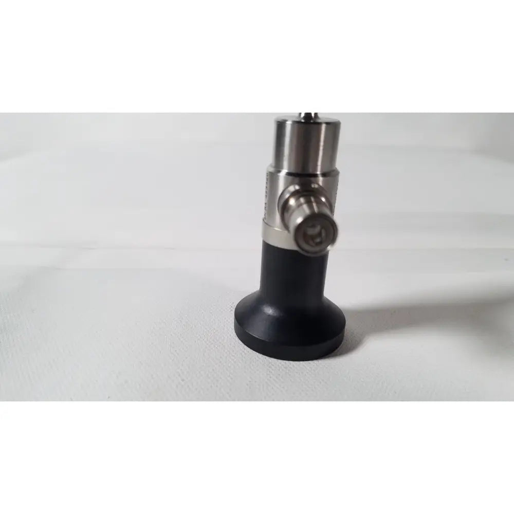 Black and silver dyonics autoclavable 4mm 70 degree arthroscope with cylindrical body and metallic connectors