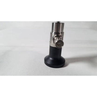 Black and silver dyonics autoclavable 4mm 70 degree arthroscope with cylindrical body and metallic connectors