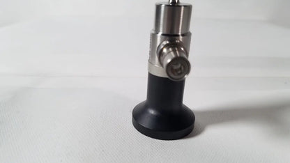 Black and silver dyonics autoclavable 4mm 70 degree arthroscope with cylindrical body and metallic connectors