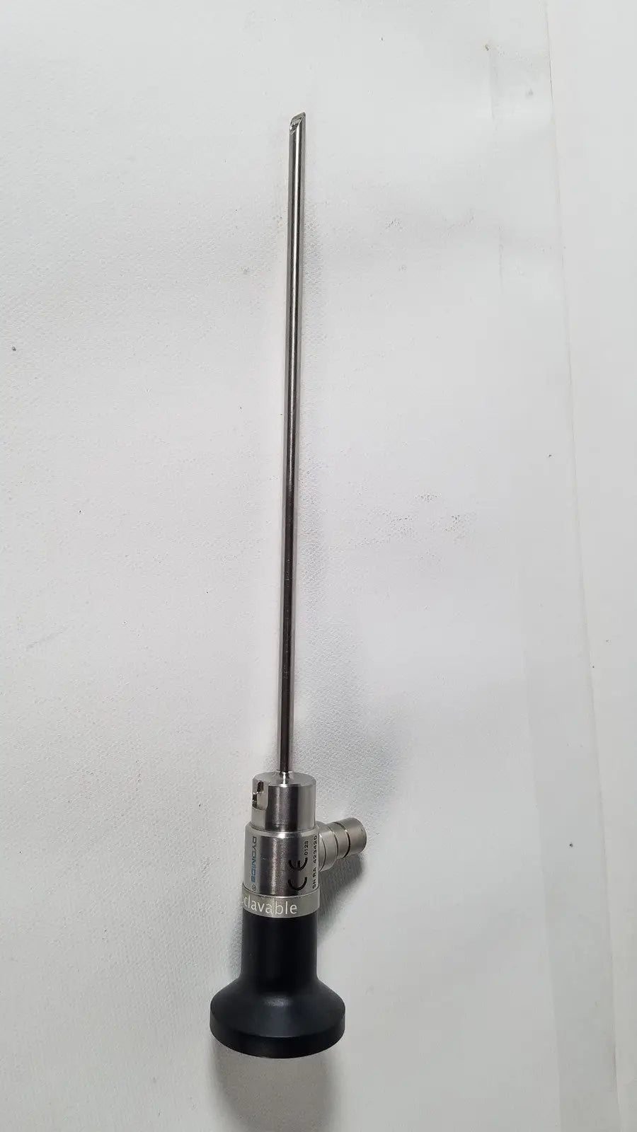 Silver dyonics autoclavable 4mm 70 degree arthroscope with black base and metallic joints for surgical use