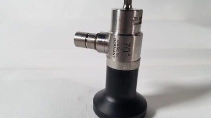 Silver and black dyonics autoclavable 4mm 70 degree arthroscope with angled tip marked made in germany on metallic body