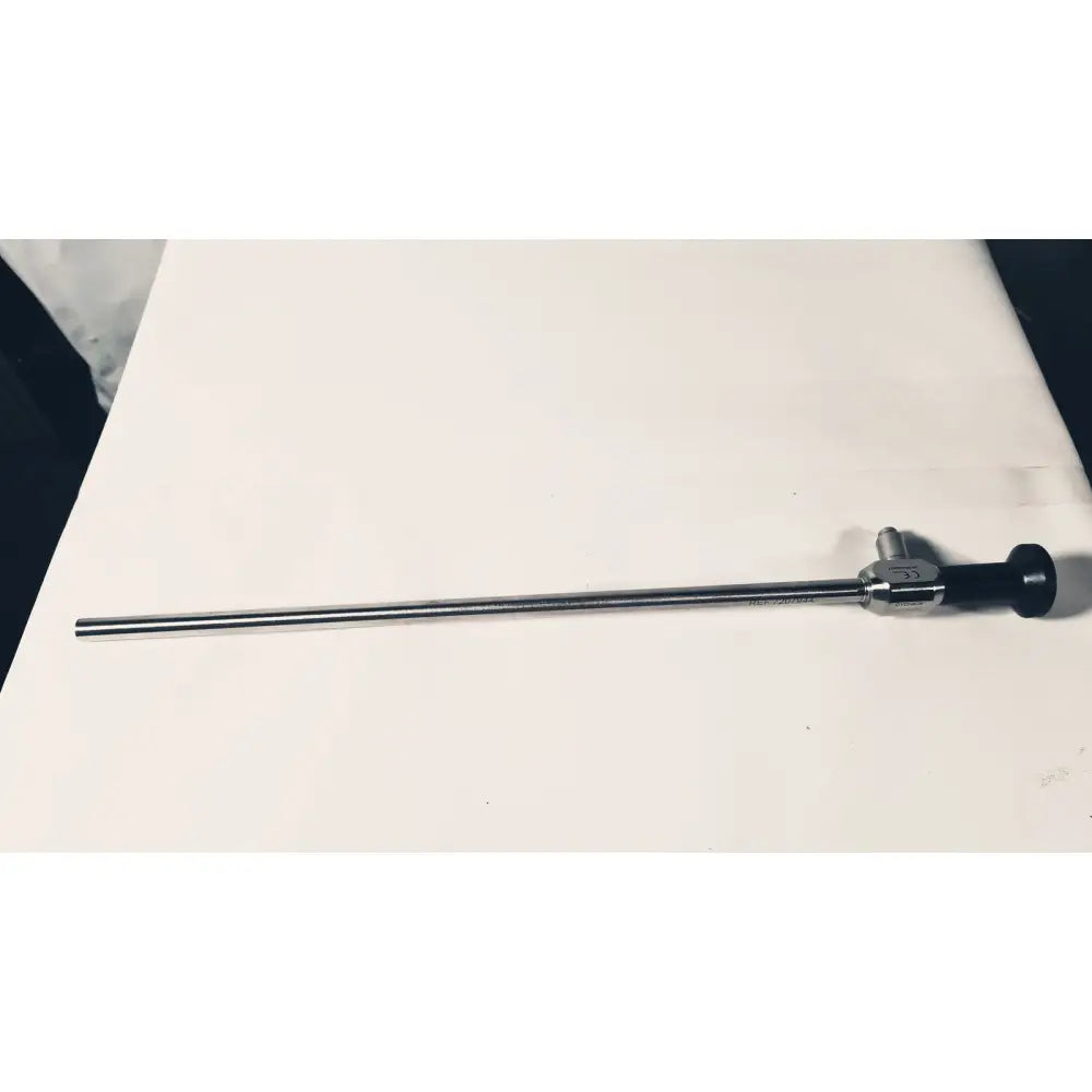Silver surgical degree 10mm laparoscope dyonics autoclave with black handle and metallic joints for precise laparoscopy