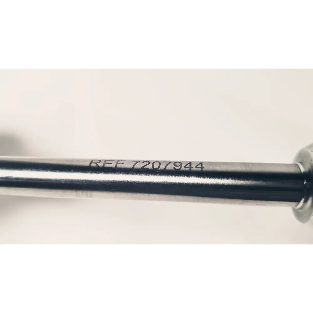 Silver metallic handle of dyonics autoclave degree 10mm laparoscope engraved with reference number ref 7207944
