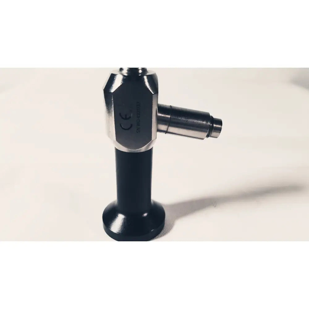 Black and silver dyonics autoclave 0 degree 10mm laparoscope with hexagonal metallic head and cylindrical black handle