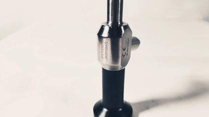 Silver-toned metallic hexagonal collar with engraved branding on black handle of dyonics autoclave degree 10mm laparoscope