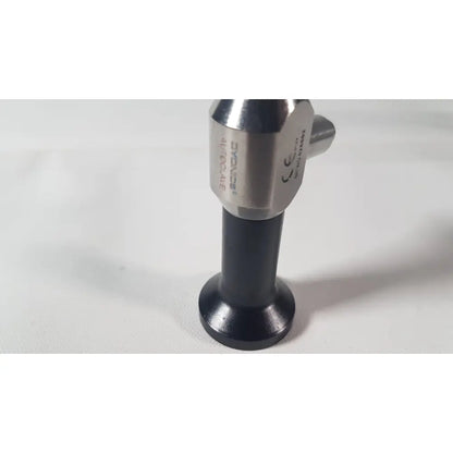 Silver and black dyonics autoclave ref 7207944 0° laparoscope with cylindrical metallic head and engraved markings on black base