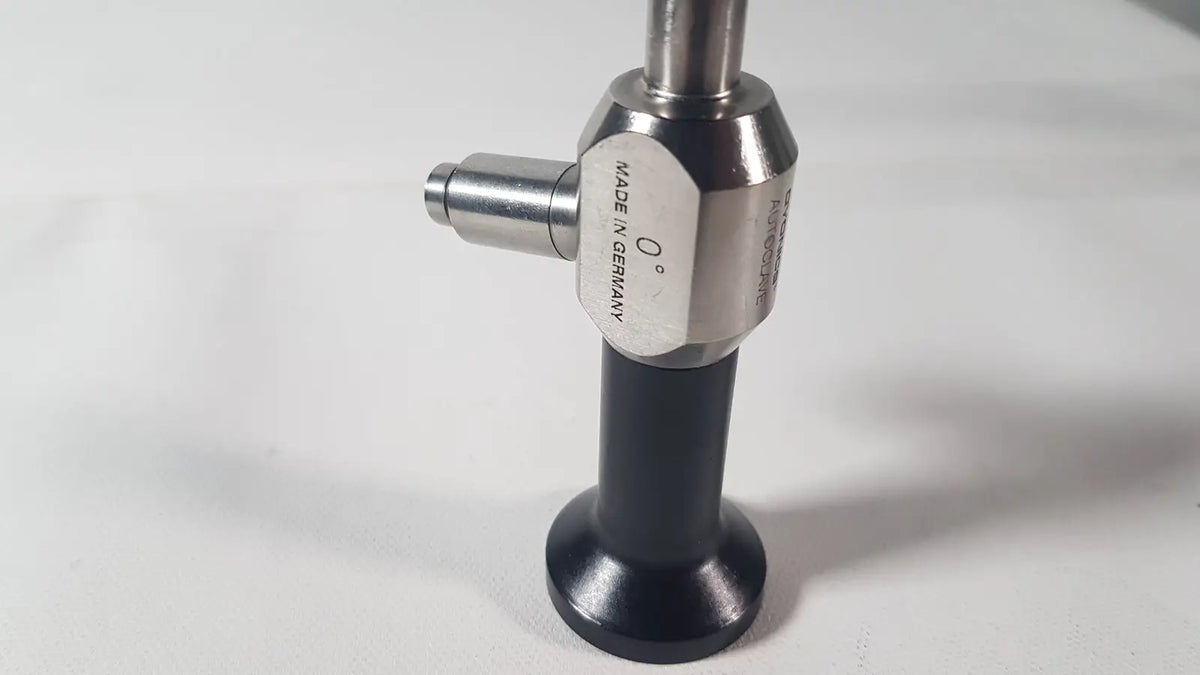 Silver and black metallic dyonics autoclave ref 7207944 0° laparoscope labeled made in germany side view