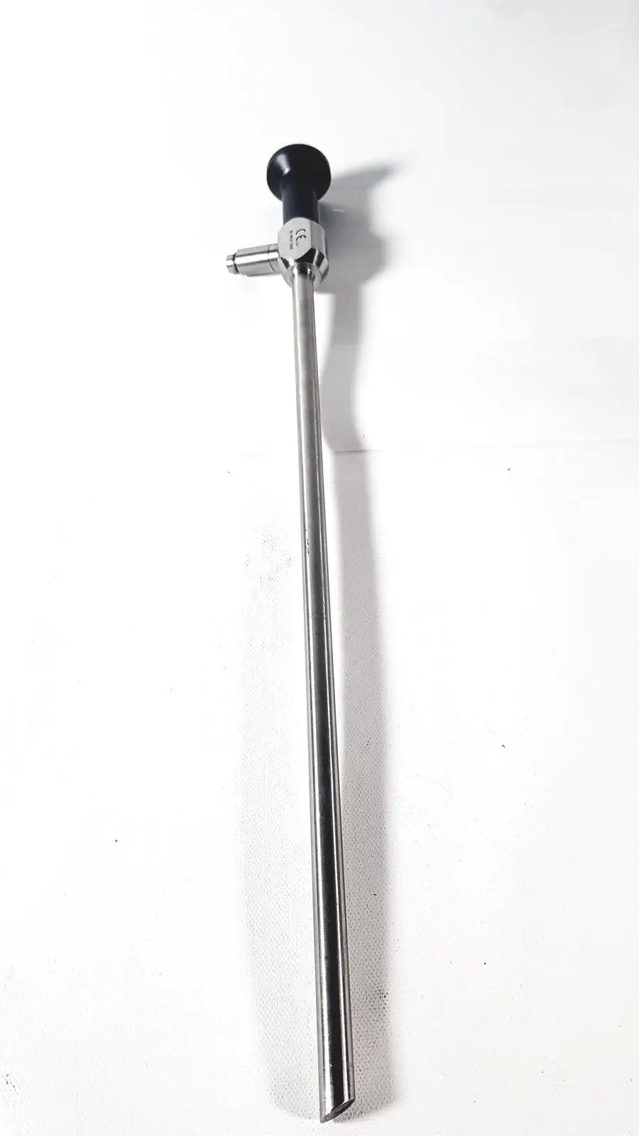 A sleek stainless steel 30° laparoscope with black ergonomic handle and precise joints dyonics autoclave ref 7207945
