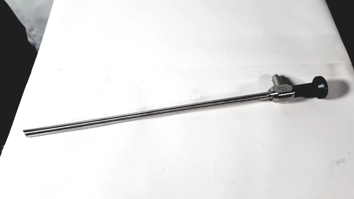 A sleek metallic 30° laparoscope with black ergonomic handle and mechanical joints for dyonics autoclave ref reuse medical
