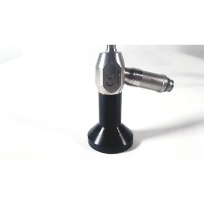 Silver and black dyonics autoclave ref 7207952 30 degree laparoscope with hexagonal metallic body labeled snw-4025c