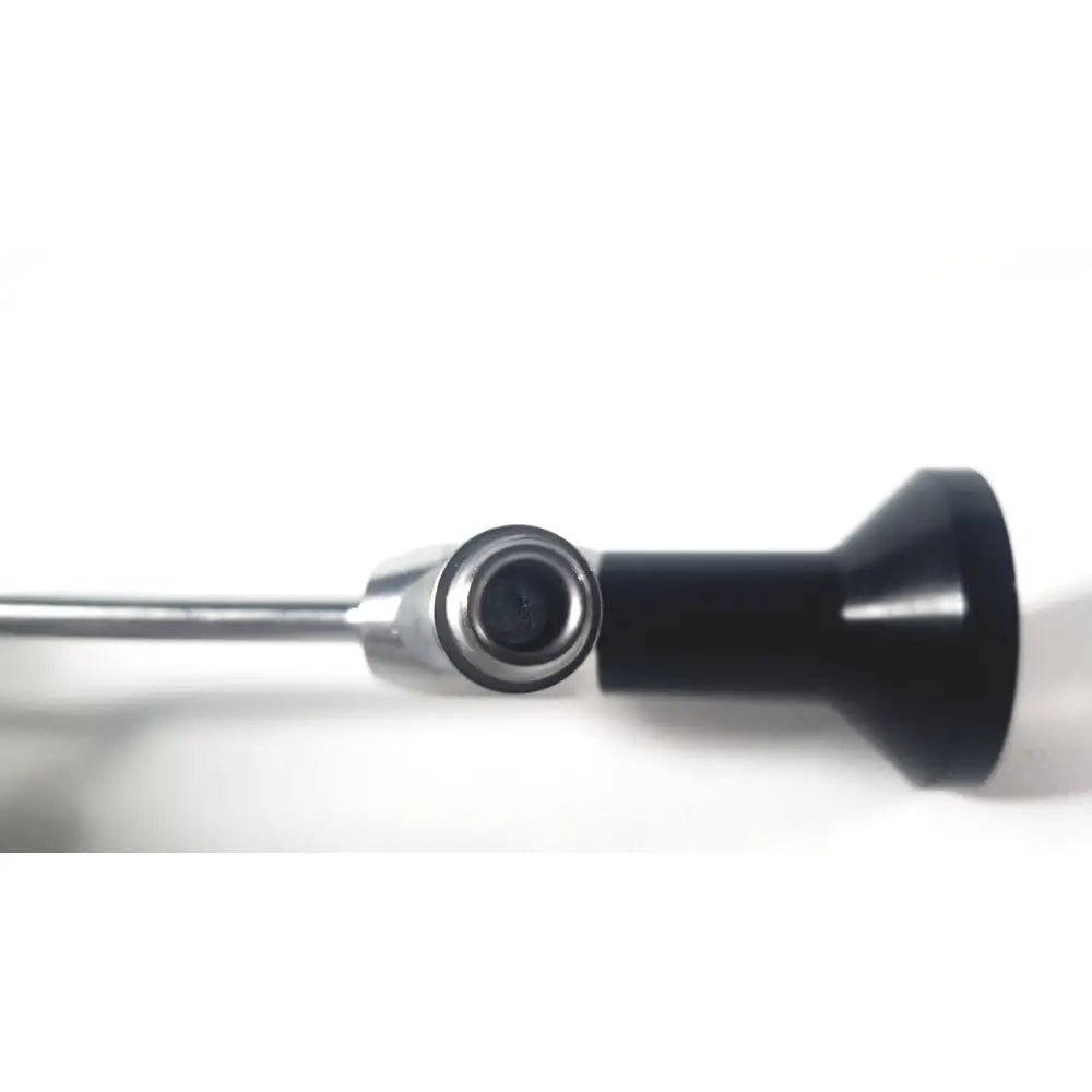 Black plastic handle with metallic connector and slender silver shaft of dyonics autoclave ref 7207952 30° laparoscope for reuse medical use