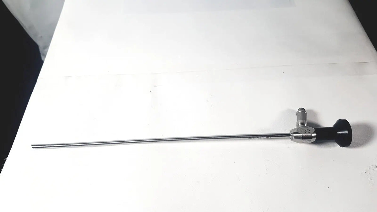 A sleek metallic dyonics autoclave ref 7207952 30° laparoscope with black ergonomic handle and silver shaft