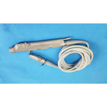 Gray metallic dyonics powermax elite shaver handpiece with coiled gray cable for advanced medical equipment use