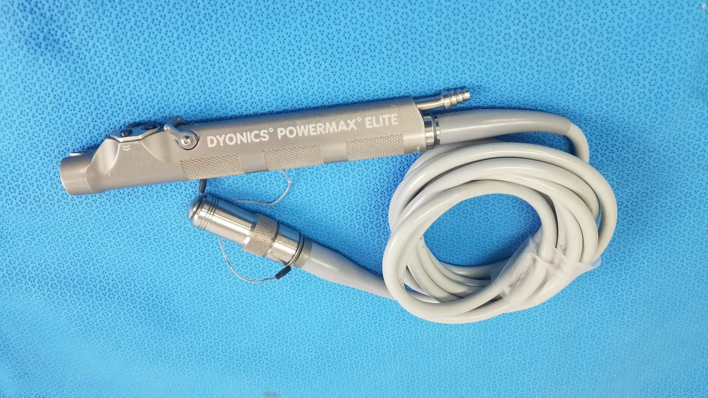 Gray metallic dyonics powermax elite shaver handpiece with coiled gray cable for advanced medical equipment use