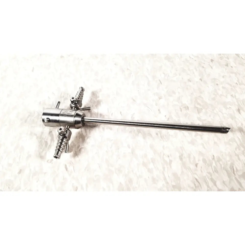 Stainless steel dyonics sheath rotatable surgical instrument with slender shaft and threaded ports on handle front side