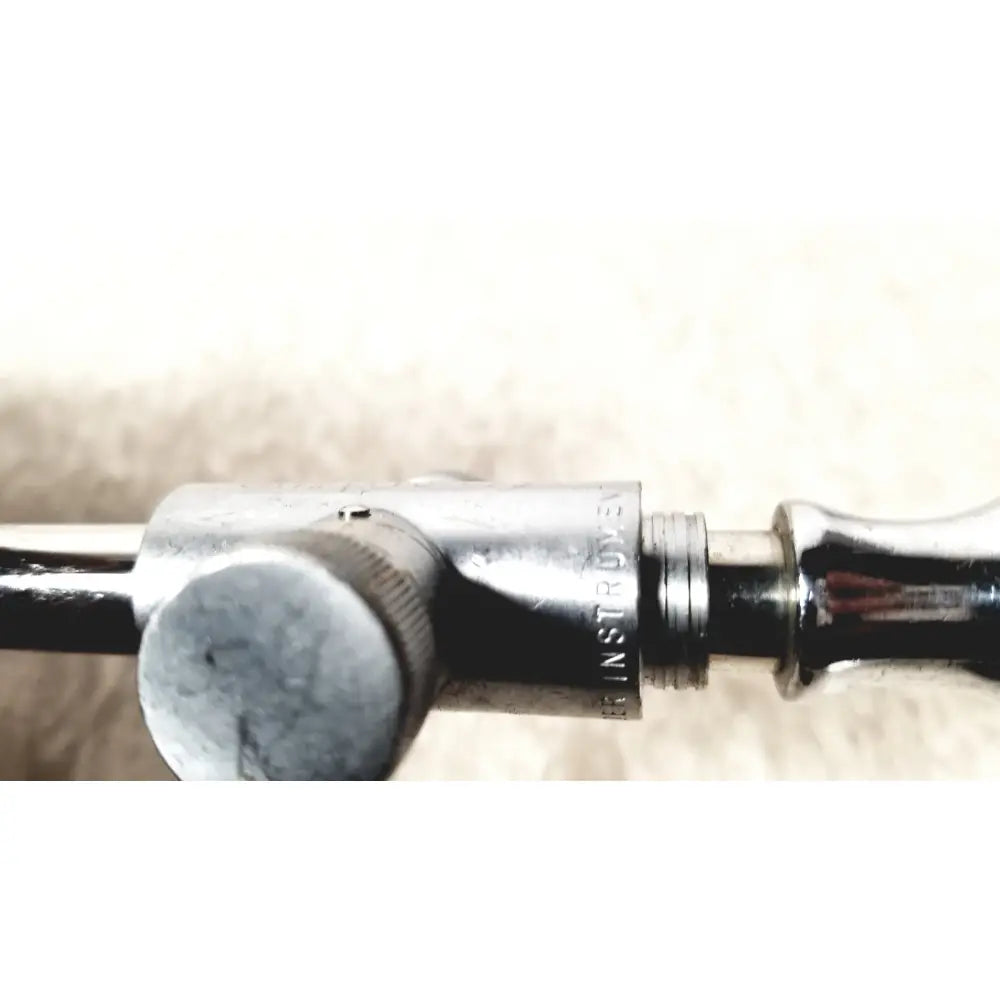 Silver metallic eder instrument cat endoscope with engraved text and knurled adjustment knob for precision use