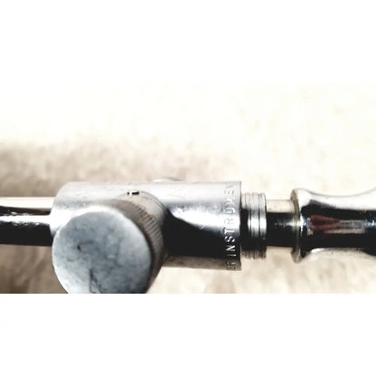 Silver metallic eder instrument cat endoscope with engraved text and knurled adjustment knob for precision use