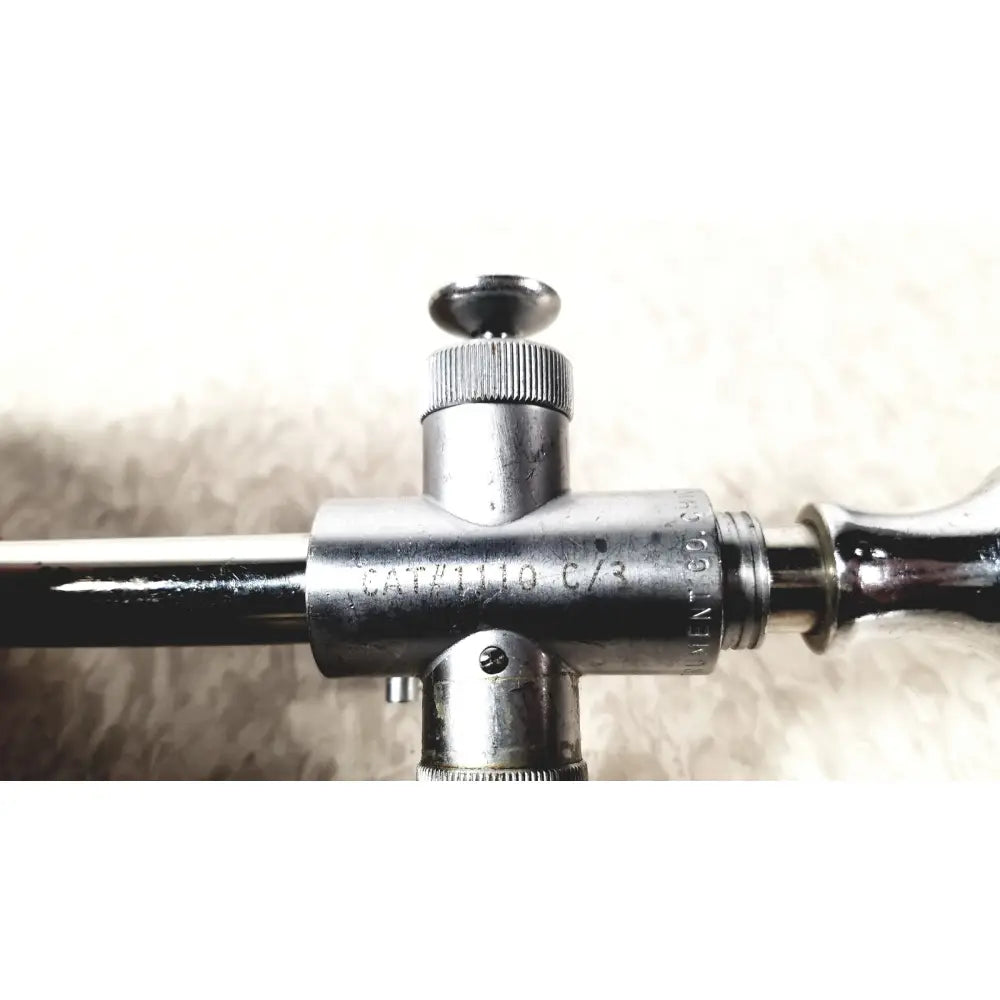 Silver metallic gas regulator with engraved markings and knurled knob from eder instrument cat 1110 c3 endoscope