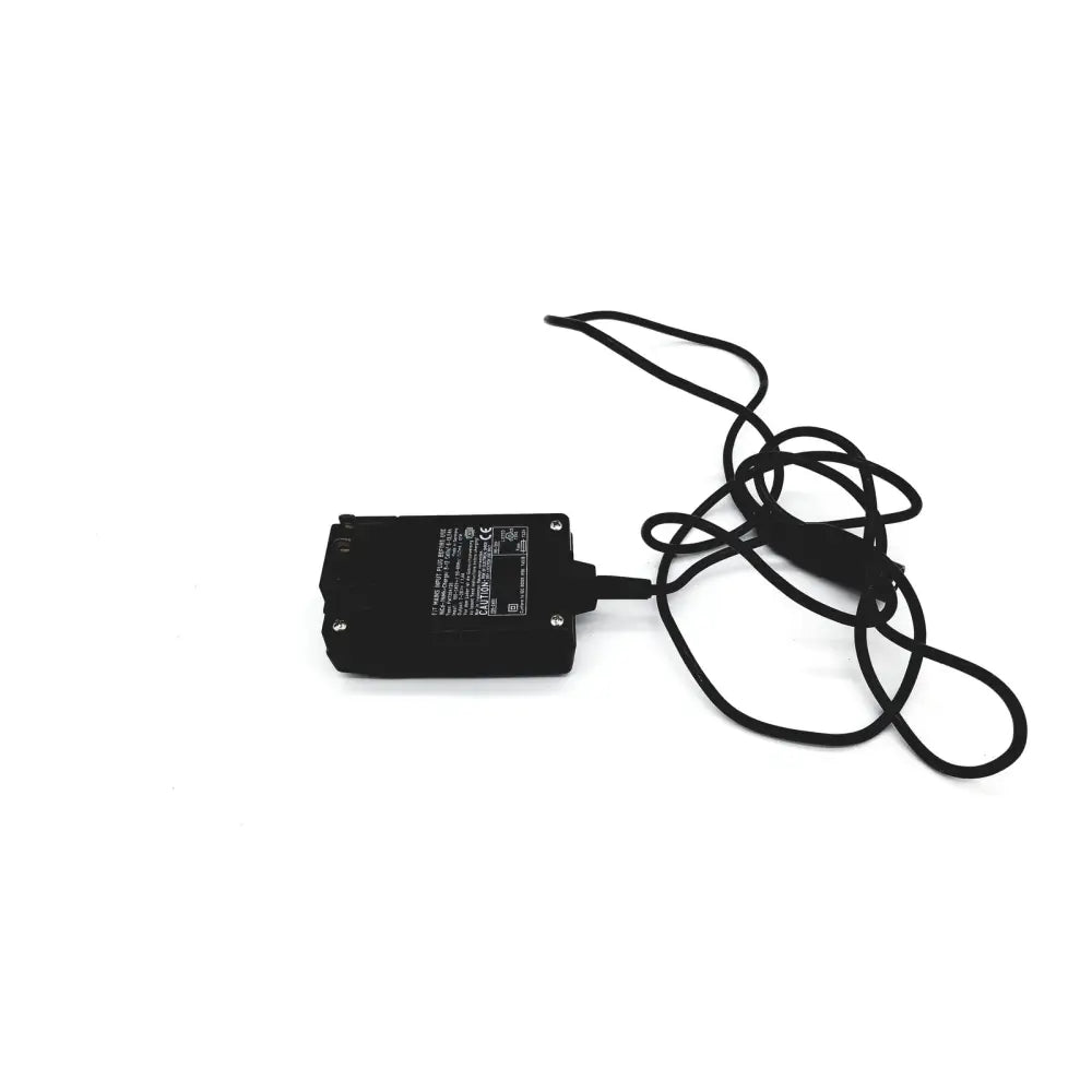 Black rectangular eds adaptor charger with coiled black cable for reuse medical device power supply and charging