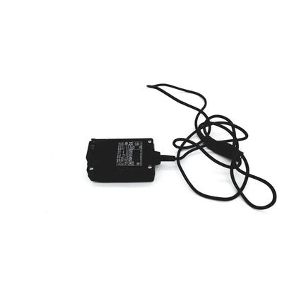Black rectangular eds adaptor charger with coiled black cable for reuse medical device power supply and charging